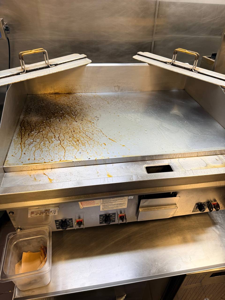 Lang commercial griddle with a stainless steel cooking surface